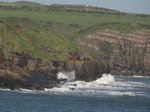 SX01390 Waves crashing against cliffs near Dunmore East.jpg